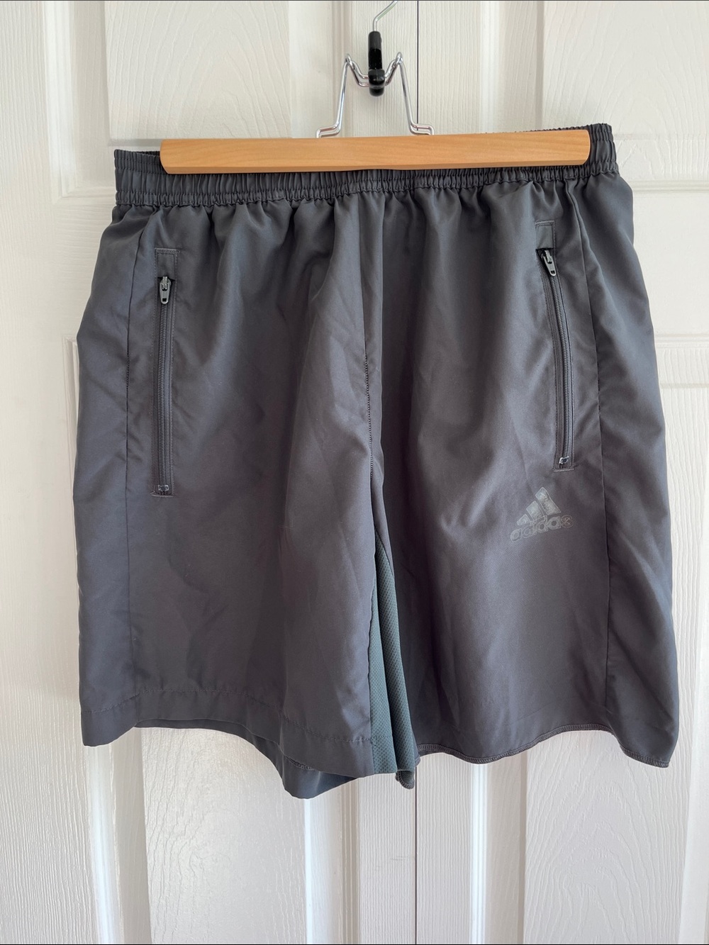 ADIDAS AEROREADY Men’s Dark Gray Shorts with Zip Pockets and waist drawstring.
